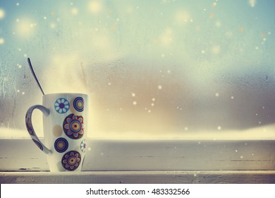 Hot Coffee Cup On A Frosty Winter Day Window Background/ Christmas Holidays Background/ Winter Cozy Background