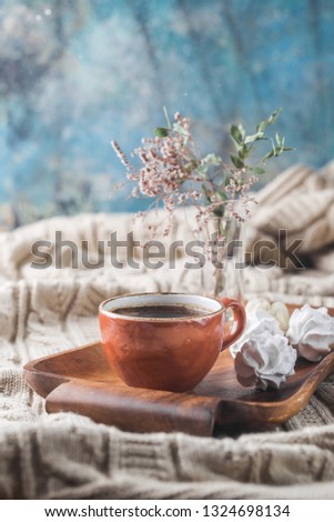 Similar – Still life with cup of tea at the window