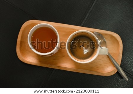 hot coffee cup with teacup