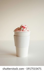 Hot Coffee Drink With Whipped Cream Topping And Sprinkles On  White Background.