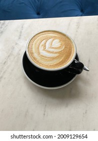 Hot Coffee Latte Art Close Up Cup On The Table