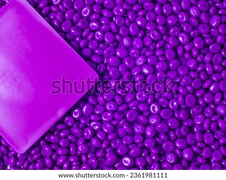 Hot cut type purple masterbatch granules with colorchips as an example of the color produced, this material is a coloring agent for products in the plastics industry