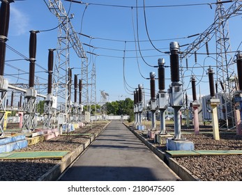 Hot day at electrical site. Substation and electrical equipment. Unfocus view of electrical tower at outdoor on summer.