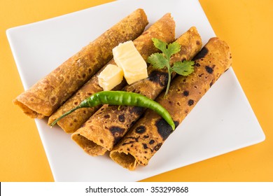 Hot Delicious Paratha Roll With Butter And Tomato Sauce