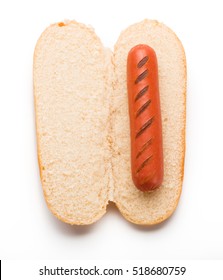 Hot Dog Bun With Grilled Sausage Isolated On White Background. Top View.