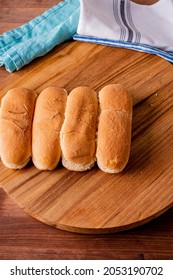 Hot Dog Buns. Bratwurst, A Pork Sausage In A Hot Dog Bun Topped With Classic Condiments Mustard, Ketchup And Sauerkraut. Classic Traditional American Baseball Game Ballpark Concession Stand Item.