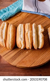 Hot Dog Buns. Bratwurst, A Pork Sausage In A Hot Dog Bun Topped With Classic Condiments Mustard, Ketchup And Sauerkraut. Classic Traditional American Baseball Game Ballpark Concession Stand Item.