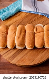 Hot Dog Buns. Bratwurst, A Pork Sausage In A Hot Dog Bun Topped With Classic Condiments Mustard, Ketchup And Sauerkraut. Classic Traditional American Baseball Game Ballpark Concession Stand Item.