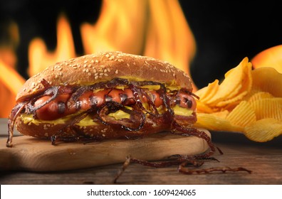 Hot Dog And Chips Against A Fire