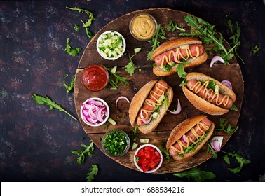 Hot Dog With Cucumber, Tomato And Red Onion On Wooden Background. Top View. Flat Lay