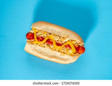 Hot Dog Isolated On Blue Background, Top View