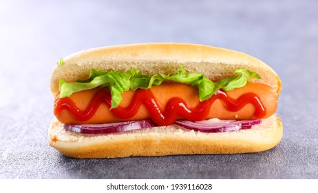 Hot Dog- Sandwich With Sausage And Lettuce With Sauce