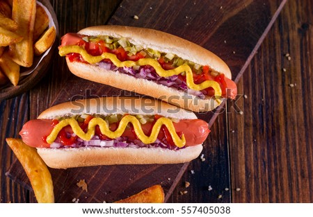  Hot Dog With Yellow Mustard, Onion, Pickles and French Fries Foto stock © 
