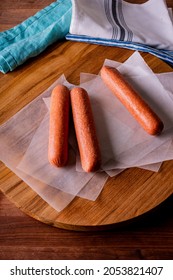 Hot Dogs. Bratwurst, A Pork Sausage In A Hot Dog Bun Topped With Classic Condiments Mustard, Ketchup And Sauerkraut. Classic Traditional American Baseball Game Ballpark Concession Stand Item.