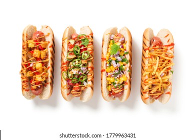 Hot dogs fully loaded with assorted toppings. isolated on white background - Powered by Shutterstock