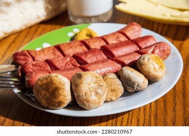 Hot dogs with mushrooms on a plate... - Powered by Shutterstock