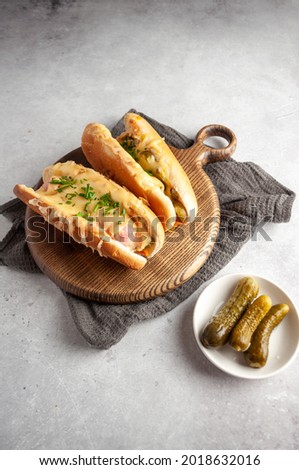 Similar – Foto Bild Fischbrötchen und Bratwurst/Pommes-Werbung auf einem Imbissdach