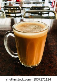 Hot Drink / Teh Tarik Is A Hot Milk Tea Beverage Which Can Be Commonly Found In Restaurants, Outdoor Stalls And Kopi Tiams Within The Southeast Asian Countries Of Malaysia And Singapore.