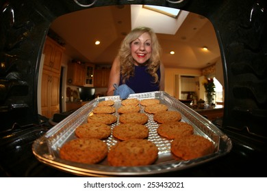 Hot And Fresh COOKIES Right From The Oven!  A Lady Bakes Cookies For A Charity Bake Sale To Help Raise Money For A Noble Cause.
