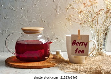 Hot Fruit Berry Tea In Glass Teapot And Cup With Red Antioxidant Beverage, Good Morning Concept