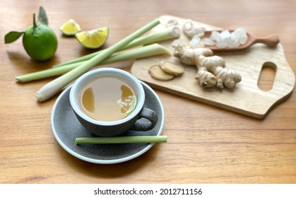 Hot ginger lemongrass lemon tea healthy drinks for immunity with 19-covic protection. High angle view herbal ginger tea, treatment ingredient for therapy