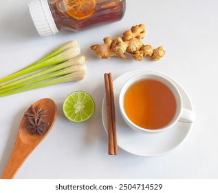 Hot ginger tea, lemongrass, lime slice,honey, cinnamon and ginger on white background. Healthy herbal drink and spices for reduce stress, increases resistance.



 - Powered by Shutterstock