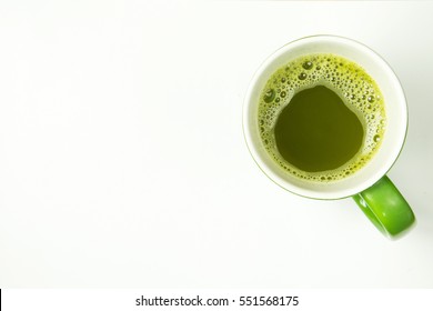 Hot Green Tea In Cup On White Background. Top View.