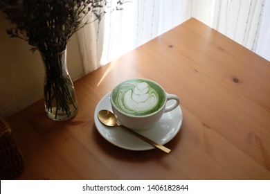 Hot Greentea Latte In Cozy Cafe