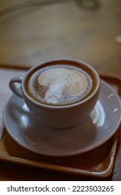 Hot latte with beautiful milk latte art making. - Shutterstock ID 2223503265