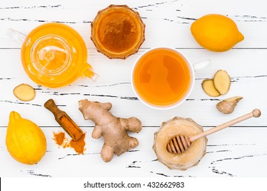 Hot lemon water with ginger, cayenne, turmeric and honey. Detox liver fat burner, immune boosting, anti inflammatory healthy drink 
