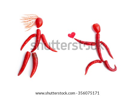 Hot love concept. Red chilli still life on white background 