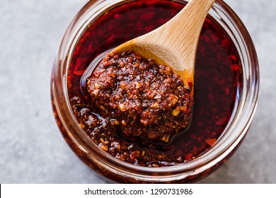 Hot Mexican Spicy Chili Red Sauce Salsa Macha With Red Pepper Powder In Jar.