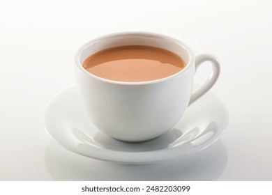 Hot milk tea ir chai served in cup isolated on grey background side view of chinese hot drink - Powered by Shutterstock