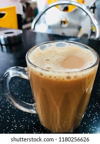 Hot Milk Tea Or Teh Tarik / Teh Tarik Is A Hot Milk Tea Beverage Which Can Be Commonly Found In Restaurants, Outdoor Stalls And Kopi Tiams