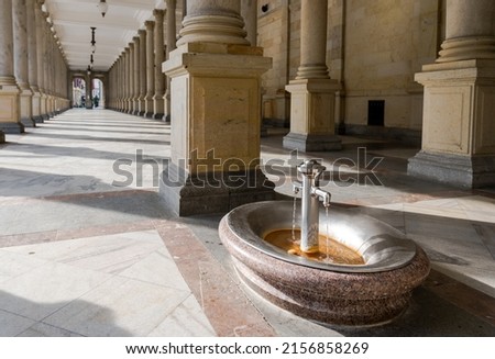 Hot mineral water source in the building The Mill Colonnade is a large historical colonnade with several hot springs in the spa town of Karlovy Vary, Czech Republic.