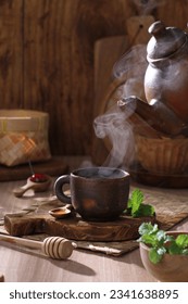hot mint tea on the table - Shutterstock ID 2341638895