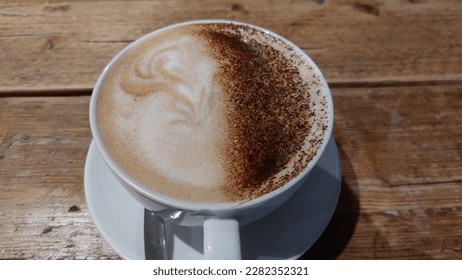 Hot mocha with chocolate powder on top