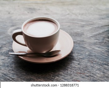 Hot Mocha Coffee Placed On A Wooden Table