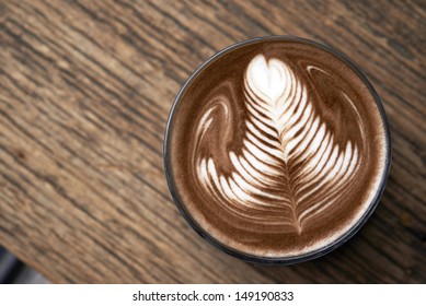 hot mocha serving on wooden table