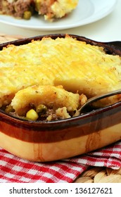 Hot From The Oven Homemade Shepherd's Pie With Cheesy Mashed Potatoes In Small Casserole Dish