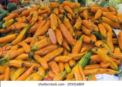 Hot Peppers (aji Amarillo) In A Peruvian Market 