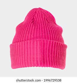 Hot Pink Beanie On A Blue Background