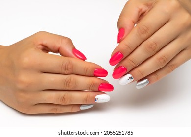 Hot Pink, White, Silver Manicure, With Silver Stripes And Crystals On The Nameless Nails. Short Oval Nails. Close-up On A White Background.