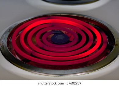 Hot Red Glowing Electric Burner - Energy Waste Concept