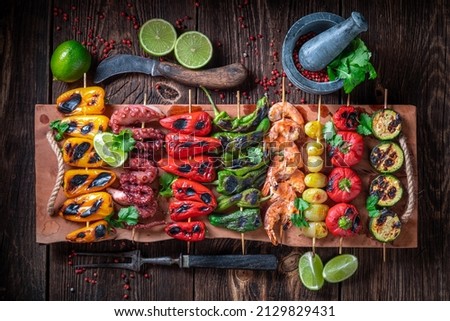 Similar – Image, Stock Photo Preparing meat skewers for grilling