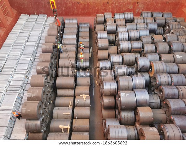 hot rolled coil or steel coils loaded in\
cargo hold of a bulk carrier or cargo\
ship.
