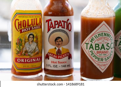 Hot Sauce Selection With Tapatio, Tabasco, Cholula. 