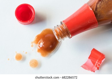 Hot Sauce Spilled From The Bottle