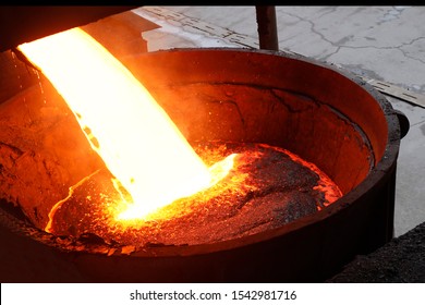 The Hot Slag Of The Copper Is Pouring To The Large Melting Pot. 