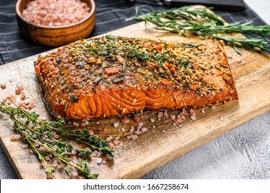 Hot Smoked Salmon Fillet On A Cutting Board. Trout. Gray Background, Top View.